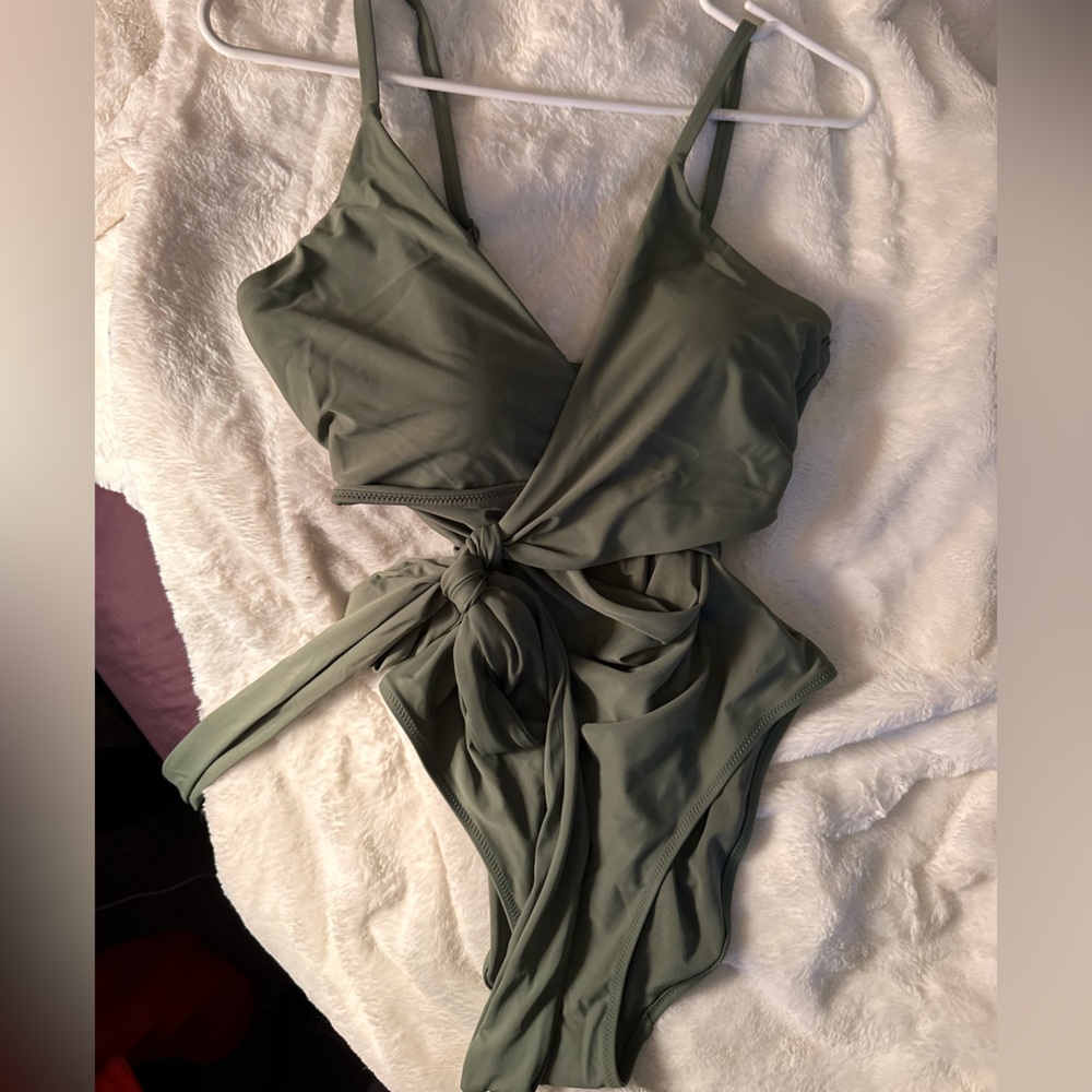 Olive colored Aerie wrapped one-piece swimsuit. New with tags. Size Large long.